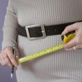 Woman with tape measure