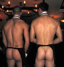 Two male strippers with bottoms showing